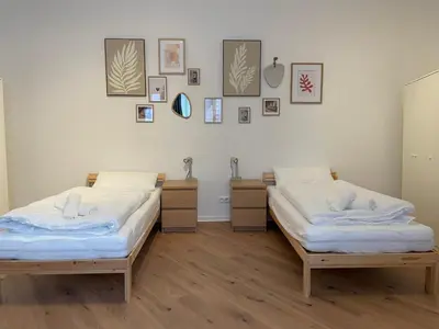 Ein Bett oder Betten in einem Zimmer der Unterkunft WhiteWood-Apartment - Nähe A43 - zentral - inkl WiFi