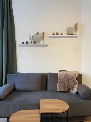 Ein Sitzbereich in der Unterkunft WhiteWood-Apartment - Nähe A43 - zentral - inkl WiFi