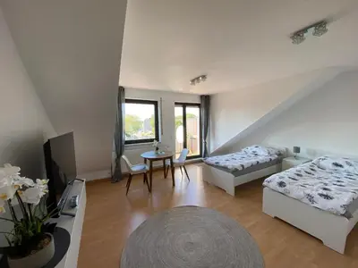 Ein Bett oder Betten in einem Zimmer der Unterkunft Am Quellberg Apartments Recklinghausen