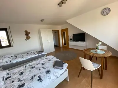 Ein Bett oder Betten in einem Zimmer der Unterkunft Am Quellberg Apartments Recklinghausen