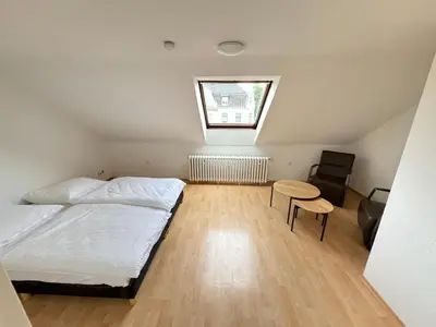 Ein Bett oder Betten in einem Zimmer der Unterkunft CITY APARTMENT - Business, Uni, Handwerker - FREE WIFI