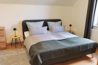 Ein Bett oder Betten in einem Zimmer der Unterkunft Stilvolles Loft am Uni-Campus 1,2km zum Audimax