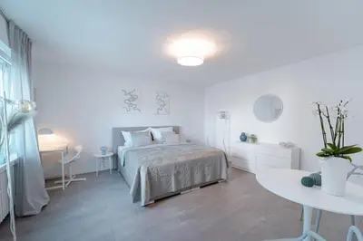 Ein Bett oder Betten in einem Zimmer der Unterkunft Zentral gelegenes Appartment
