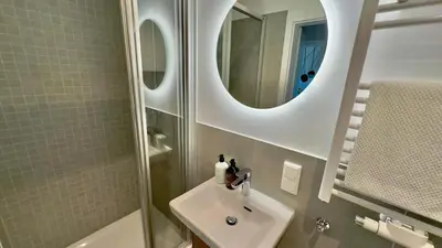 Ein Badezimmer in der Unterkunft Sankt Göres Suites