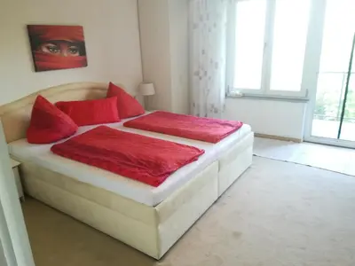 Ein Bett oder Betten in einem Zimmer der Unterkunft Gaestehaus Jagsttalblick