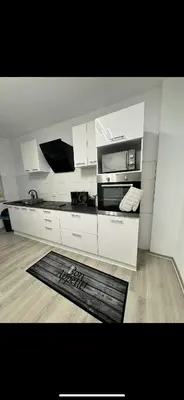 Küche/Küchenzeile in der Unterkunft Stylish & Relaxing Modernes Apartment mit Privatparkplatz