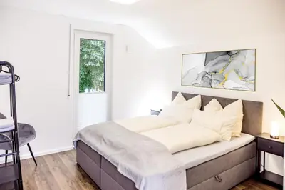 Ein Bett oder Betten in einem Zimmer der Unterkunft FEEL - Comfort Haus Münsterblick - Nahe Münster