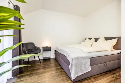 Ein Bett oder Betten in einem Zimmer der Unterkunft FEEL - Comfort Haus Münsterblick - Nahe Münster