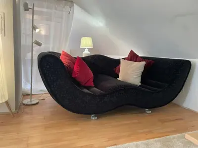 Ein Sitzbereich in der Unterkunft Das purpur Haus für Dich alleine!