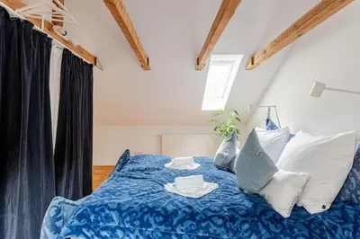 Ein Bett oder Betten in einem Zimmer der Unterkunft Das blaue Haus allein für Dich!