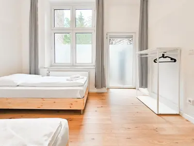 Ein Bett oder Betten in einem Zimmer der Unterkunft Tolstov Apartments - 2 Zimmer Wohnung mit Terrasse - 25 Min Messe DUS