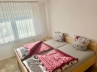 Ein Bett oder Betten in einem Zimmer der Unterkunft Airhome16, Wohnung in Messenähe