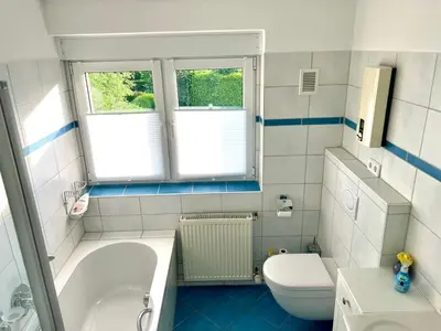 Ein Badezimmer in der Unterkunft Airhome16, Wohnung in Messenähe