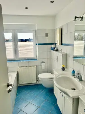 Ein Badezimmer in der Unterkunft Airhome16, Wohnung in Messenähe