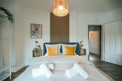 Ein Bett oder Betten in einem Zimmer der Unterkunft Domblick 2 I Balkon I Parkplatz I Nähe Veltins-Arena