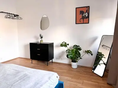 Ein Bett oder Betten in einem Zimmer der Unterkunft ThinkPink! Apartment im Herzen Dortmunds