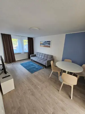 Ein Sitzbereich in der Unterkunft Helle und ruhige Ferienwohnung im Ruhrgebiet mit Balkon und Garten