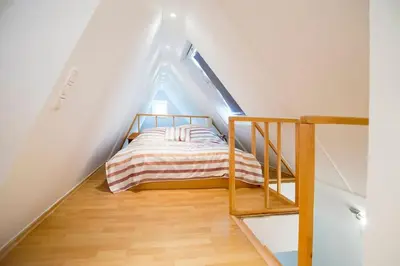 Ein Bett oder Betten in einem Zimmer der Unterkunft Maisonette Wohnung Bolkerstraße in Düsseldorf