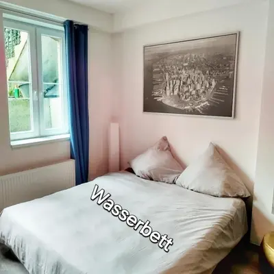 Ein Bett oder Betten in einem Zimmer der Unterkunft Studio Apartment am Zoo