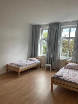Ein Bett oder Betten in einem Zimmer der Unterkunft ES-Unterkunft Dinslaken
