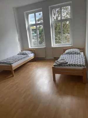 Ein Bett oder Betten in einem Zimmer der Unterkunft ES-Unterkunft Dinslaken