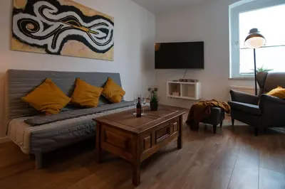 TV/Unterhaltungsangebot in der Unterkunft Modernes Kunst-Apartment