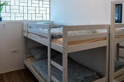Ein Bett oder Betten in einem Zimmer der Unterkunft Old Pub in New Design for up to 12 people