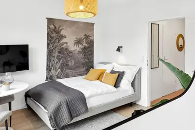 Ein Bett oder Betten in einem Zimmer der Unterkunft City - Luxus Apartment Lift & Parken -Nähe DUS & Dortmund & Köln & Essen