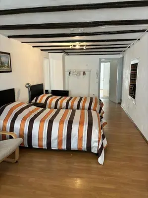 Ein Bett oder Betten in einem Zimmer der Unterkunft Duesseldorf altstadt bolkerstr