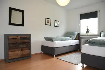 Ein Bett oder Betten in einem Zimmer der Unterkunft JuPa Homes
