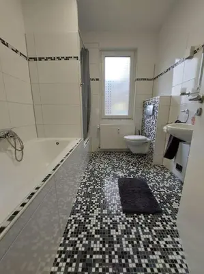 Ein Badezimmer in der Unterkunft Schöne helle 50qm Suite mit großer Küche