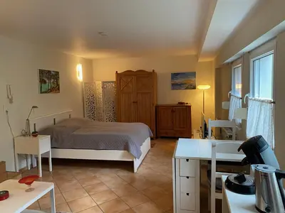 Ein Bett oder Betten in einem Zimmer der Unterkunft Einzimmer-Apartment nahe Messe Düsseldorf