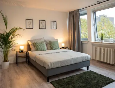 Ein Bett oder Betten in einem Zimmer der Unterkunft Stilvolles Apartment im Essener Stadtkern