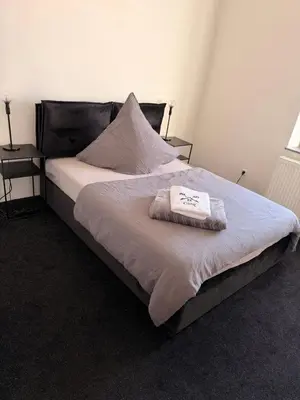 Ein Bett oder Betten in einem Zimmer der Unterkunft Ferien Monteur Haus C&M