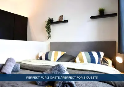 Ein Bett oder Betten in einem Zimmer der Unterkunft RtR Apartment Herne - Für bis zu 2 Personen - Voll ausgestattet - Zentrum - Smart TV - WIFI - Modern