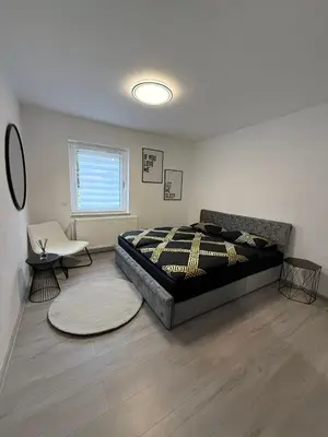 Ein Bett oder Betten in einem Zimmer der Unterkunft Hammer Apartment