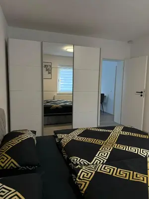 Ein Bett oder Betten in einem Zimmer der Unterkunft Hammer Apartment