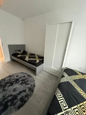 Ein Bett oder Betten in einem Zimmer der Unterkunft Hammer Apartment