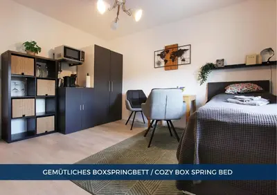 Ein Bett oder Betten in einem Zimmer der Unterkunft RtR Apartment Herne - Für 1 Person - Voll ausgestattet - Zentrum - Parken - Smart TV - WIFI - Modern