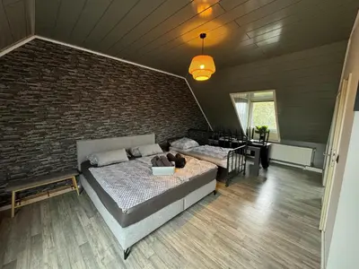 Ein Bett oder Betten in einem Zimmer der Unterkunft Brooklyn Loft by HII