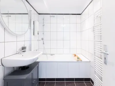 Ein Badezimmer in der Unterkunft Zentrales Apartment Essen Kaffeevollautomat Parkplatz