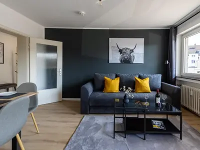 Ein Sitzbereich in der Unterkunft Zentrales Apartment Essen Kaffeevollautomat Parkplatz