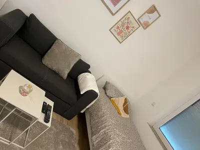 Ein Sitzbereich in der Unterkunft Gemütliches City Apartment