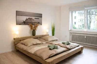 Ein Bett oder Betten in einem Zimmer der Unterkunft MODERN 2 ROOM Apartment in Rüttenscheid