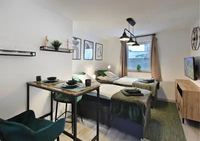 Ein Sitzbereich in der Unterkunft RtR Essen - Für bis zu 2 Personen - Voll ausgestattet - Balkon - Zentral Limbecker Platz - Messe - Uniklinikum - Smart TV - Modern