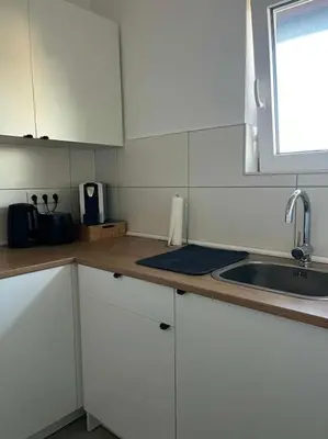 Küche/Küchenzeile in der Unterkunft Gemütliche Wohnung nahe Messe und Flughafen