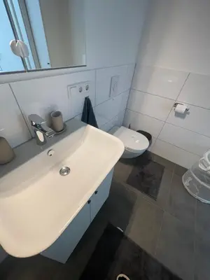 Ein Badezimmer in der Unterkunft Deluxe Apartment Ruhr Oase, Neubau, 4 Personen, Parkplatz,