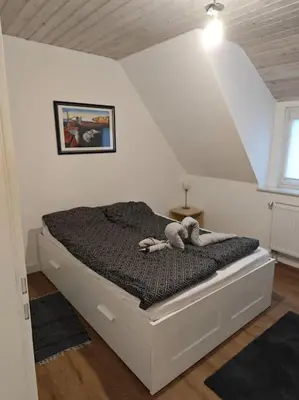 Ein Bett oder Betten in einem Zimmer der Unterkunft Gemütliche Ferienwohnung