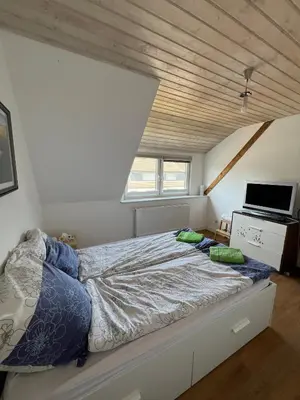 Ein Bett oder Betten in einem Zimmer der Unterkunft Gemütliche Ferienwohnung