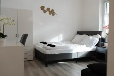 Ein Bett oder Betten in einem Zimmer der Unterkunft Business Apartment 5 Essen
